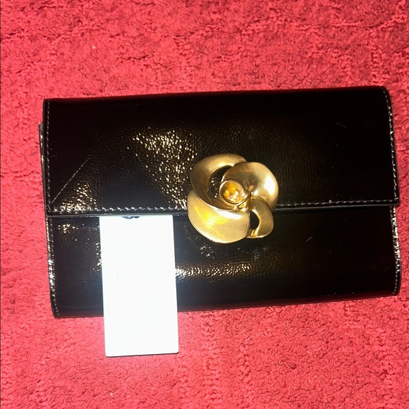 Elegant Black and Gold Clutch with Chain by Ted Baker - Picture 2 of 10